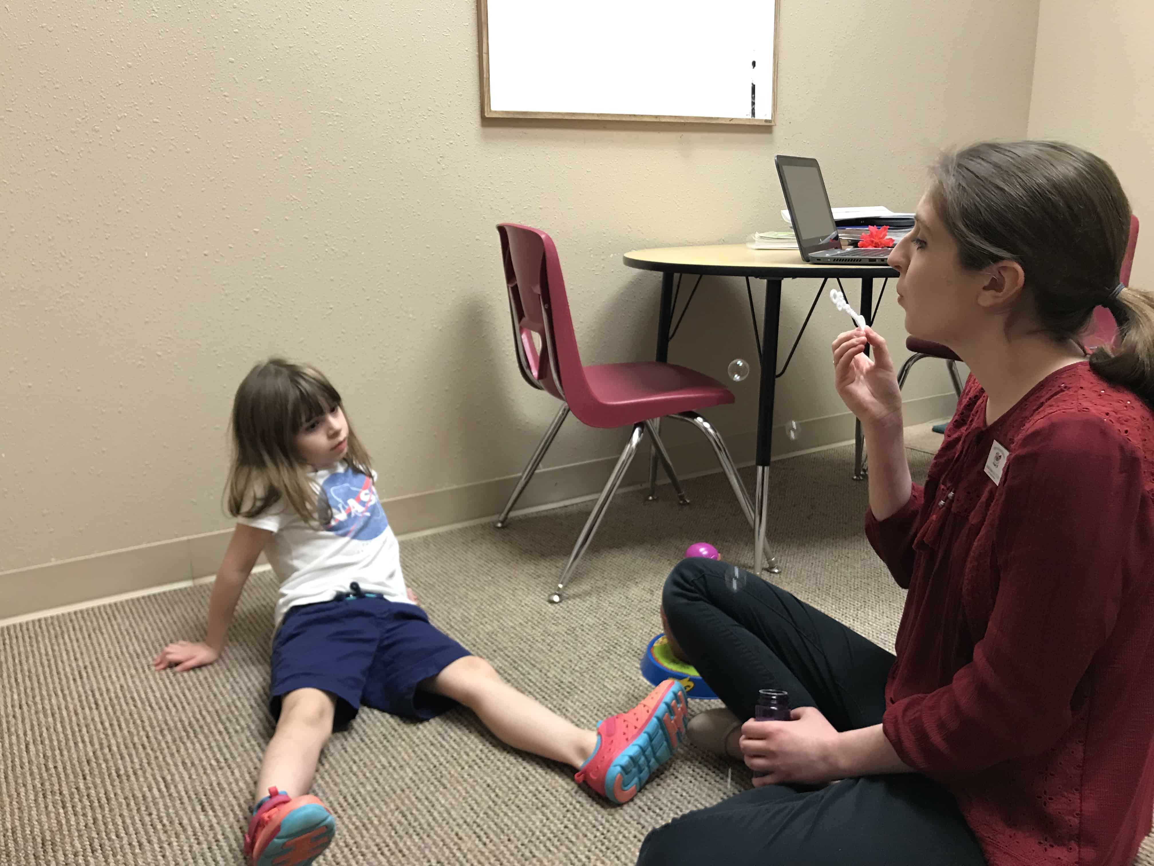 Girl In Speech Therapy Session